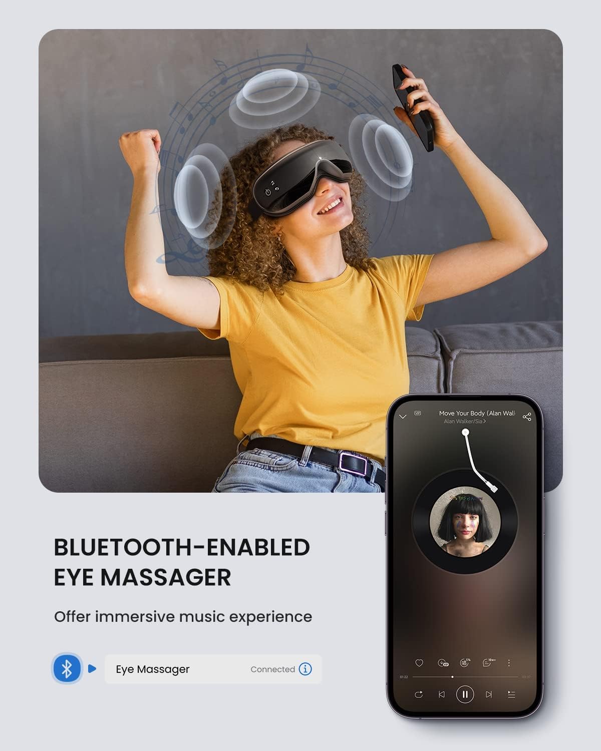 A young woman with curly hair, wearing a yellow t-shirt, enjoys a Renpho Eyeris 1 Eye Massager featuring bluetooth connectivity while lifting her arms in relaxation. Next to her is an image of a smartphone displaying the